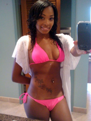 Pink bikini on a dark skinned body looks hot